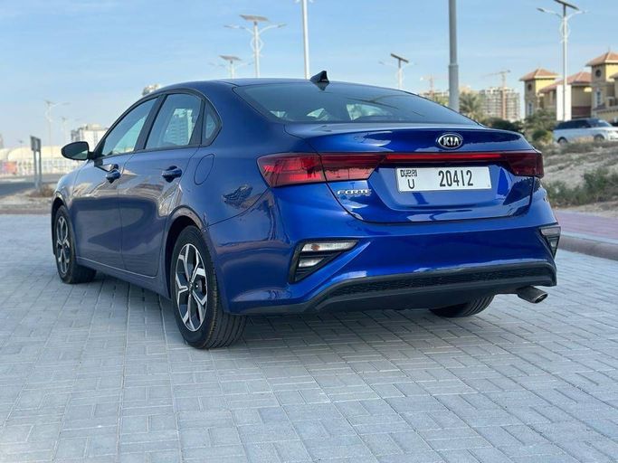 Kia Forte III Facelift, 2022  sedan for rent in Dubai by more rent a car, blue color | AUTO.AE