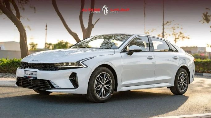 New Kia K5 III, 1.5 l, 2025 in Dubai by Altass Motors, White color. Other | AUTO.AE