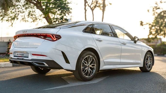 New Kia K5 III, 1.5 l, 2025 in Dubai by Altass Motors, White color. Other | AUTO.AE