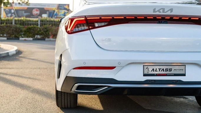 New Kia K5 III, 1.5 l, 2025 in Dubai by Altass Motors, White color. Other | AUTO.AE