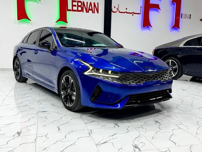 مستعملة Kia K5 ثالثاً, 1.6 l, 2022 في في دبي من F1 Motors، اللون أزرق. المواصفات الأمريكية | AUTO.AE