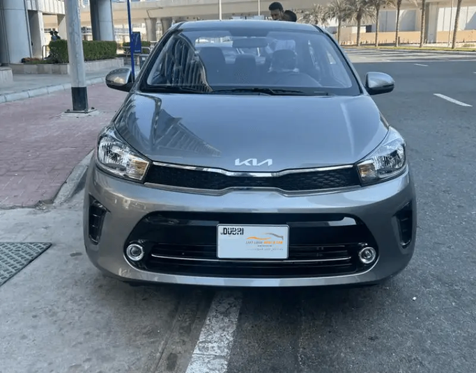 Kia Pegas, 2023  sedan for rent in Dubai by Left lane rent a car llc, grey color | AUTO.AE