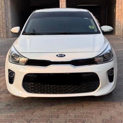 Подержанный Kia Rio IV (Global market), 1.4 л, 2018 в Дубае Белый цвет. GCC | AUTO.AE