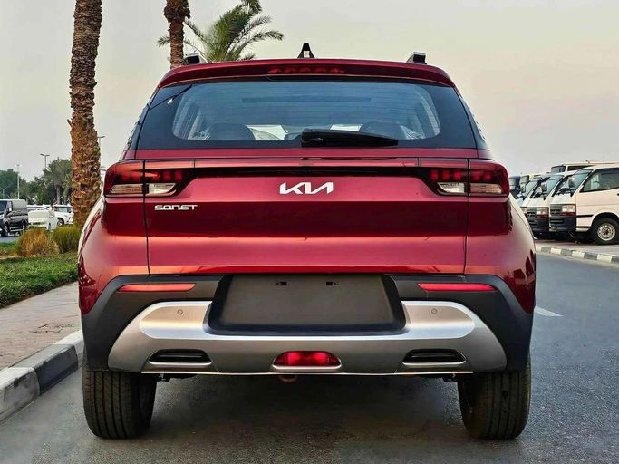 New Kia Sonet I, 1.5 l, 2023 in Dubai by SK Motors, Red color. GCC Specs | AUTO.AE