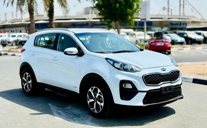 Used Kia Sportage IV Facelift, 2.4 l, 2020 in Dubai by Verified Hub Used Automobile Trading LLC, White color. GCC Specs | AUTO.AE