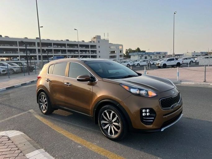 Used Kia Sportage IV, 2.4 l, 2018 in Dubai by Shamshad Motors FZCO, Golden color. American Specs | AUTO.AE