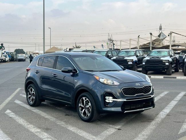 Used Kia Sportage IV Facelift, 2.4 l, 2020 in Dubai by SIKANDAR MOTORS, Blue color. American Specs | AUTO.AE | Listing #243061