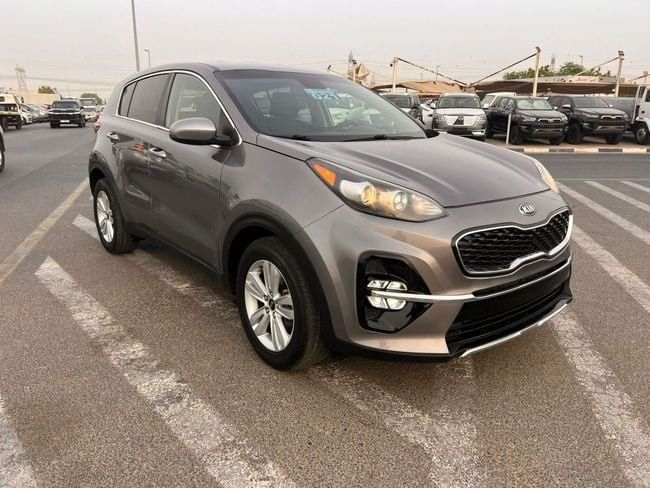 Used Kia Sportage IV Facelift, 2.4 l, 2019 in Dubai by SIKANDAR MOTORS, Grey color. American Specs | AUTO.AE | Listing #243084