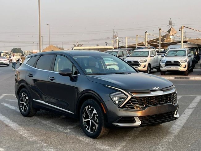 Used Kia Sportage V, 2.5 l, 2024 in Dubai by SIKANDAR MOTORS, Grey color. American Specs | AUTO.AE
