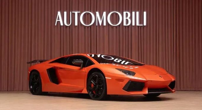 Подержанный Lamborghini Aventador LP700-4 I, 6.5 л, 2014 в Дубае от Automobili Motors Оранжевый цвет. GCC | AUTO.AE