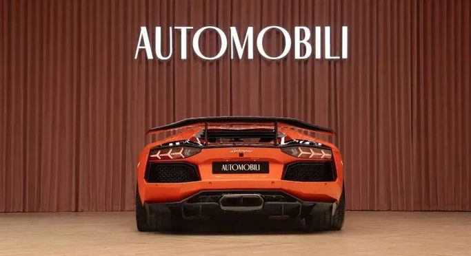 Подержанный Lamborghini Aventador LP700-4 I, 6.5 л, 2014 в Дубае от Automobili Motors Оранжевый цвет. GCC | AUTO.AE