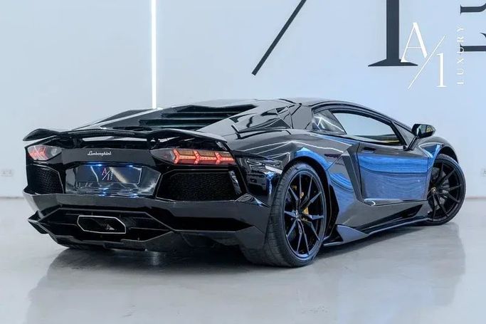 Подержанный Lamborghini Aventador LP700-4 I, 6.5 л, 2013 в Дубае от A1 Luxury Motors Черный цвет. GCC | AUTO.AE
