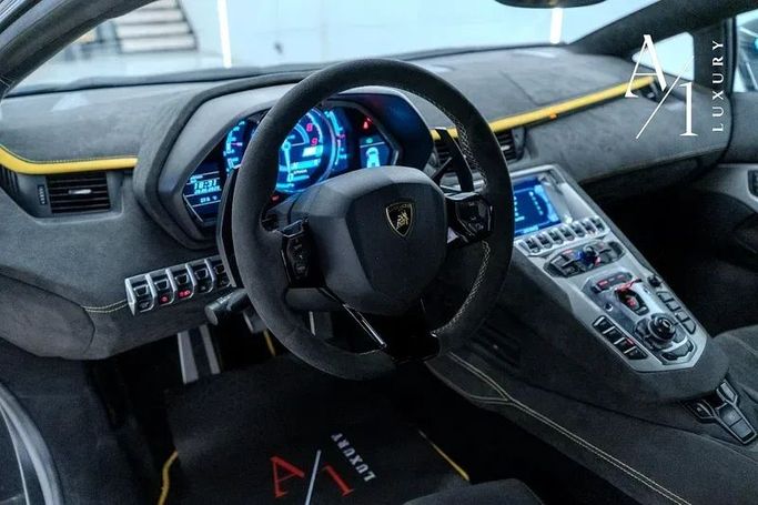 Подержанный Lamborghini Aventador LP700-4 I, 6.5 л, 2013 в Дубае от A1 Luxury Motors Черный цвет. GCC | AUTO.AE