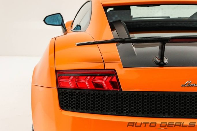 Подержанный Lamborghini Gallardo I Рестайлинг, 5.2 л, 2011 в Дубае от AUTO DEALS Оранжевый цвет. GCC | AUTO.AE