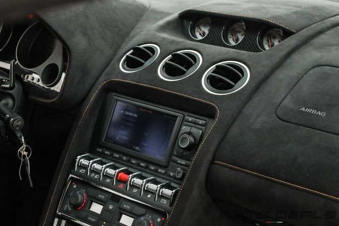 Подержанный Lamborghini Gallardo I Рестайлинг, 5.2 л, 2011 в Дубае от AUTO DEALS Оранжевый цвет. GCC | AUTO.AE