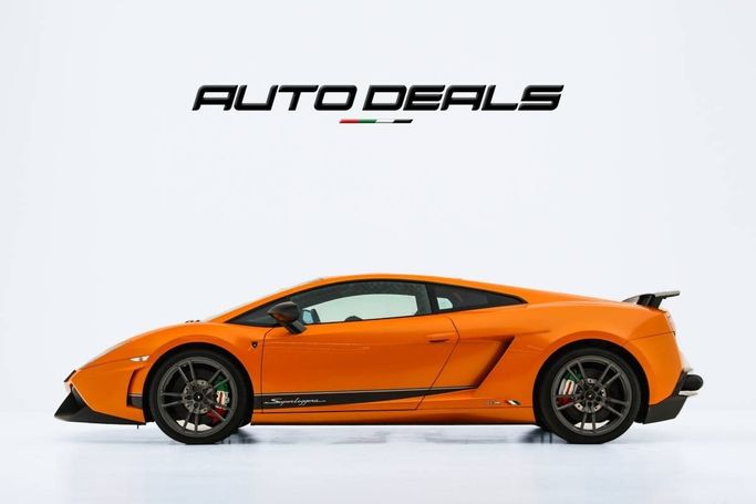 Подержанный Lamborghini Gallardo I Рестайлинг, 5.2 л, 2011 в Дубае от AUTO DEALS Оранжевый цвет. GCC | AUTO.AE
