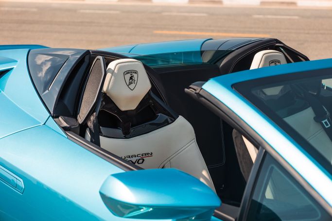 Lamborghini Huracán I, 2024 sport roadster for rent in Dubai by POF RENTAL, light blue color | AUTO.AE