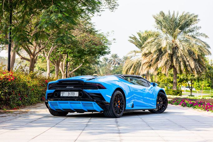 Lamborghini Huracán I, 2024 sport roadster for rent in Dubai by POF RENTAL, light blue color | AUTO.AE