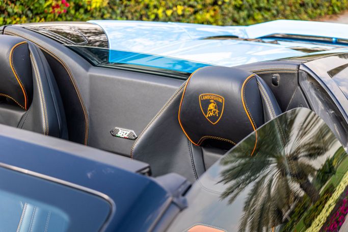 Lamborghini Huracán I, 2024 sport roadster for rent in Dubai by POF RENTAL, light blue color | AUTO.AE