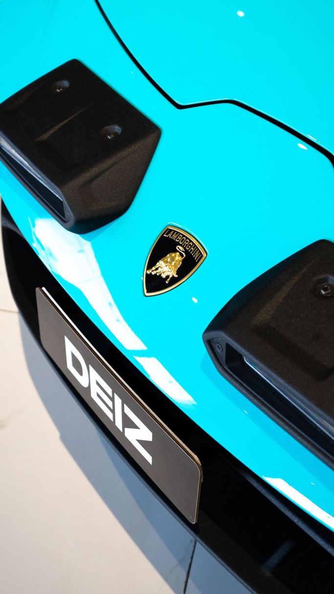 Lamborghini Huracán I, 2024 sport coupe for rent in Dubai by DEIZ, light blue color | AUTO.AE