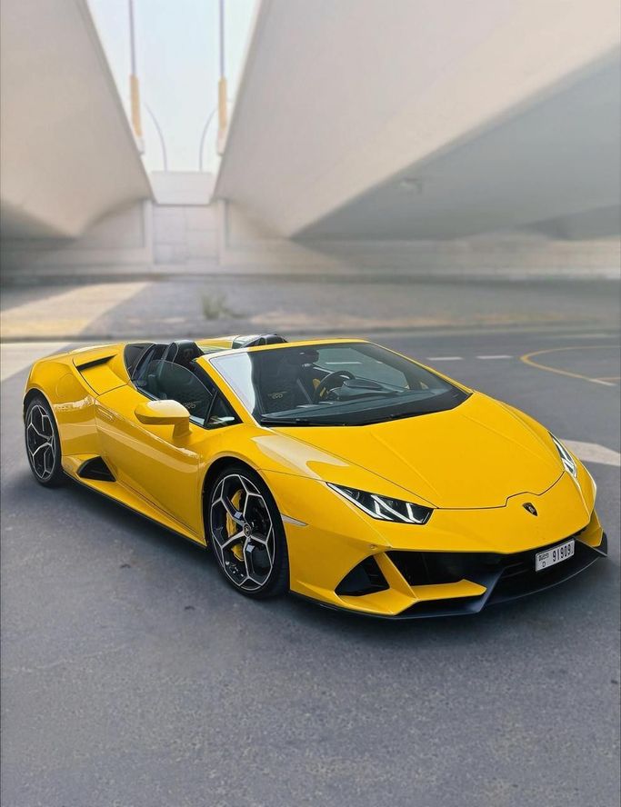 Lamborghini Huracán EVO Spyder I Facelift, 2023  roadster spyder for rent in Dubai by ACR DXB, yellow color | AUTO.AE