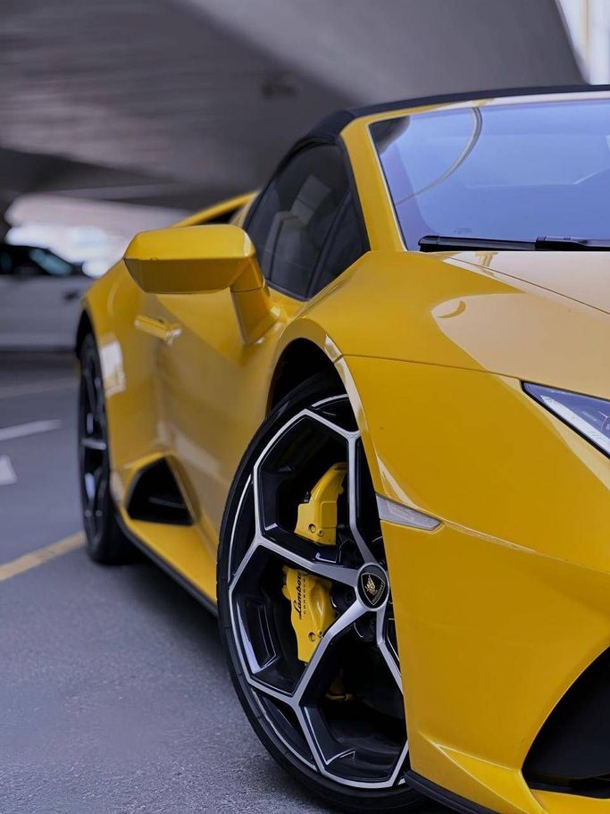 Lamborghini Huracán EVO Spyder I Facelift, 2023  roadster spyder for rent in Dubai by ACR DXB, yellow color | AUTO.AE