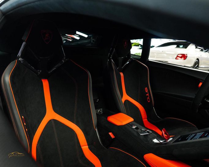 Новый Lamborghini Huracán STO I Рестайлинг, 5.2 л, 2022 в Дубае от Pearl Motors Черный цвет. Европейская | AUTO.AE