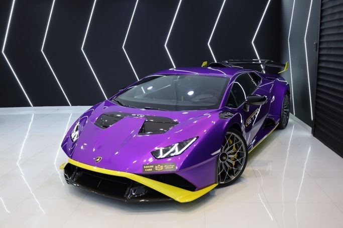 Used Lamborghini Huracán STO I Facelift, 5.2 l, 2022 in Dubai by Sanam Cars, Purple color. GCC Specs | AUTO.AE