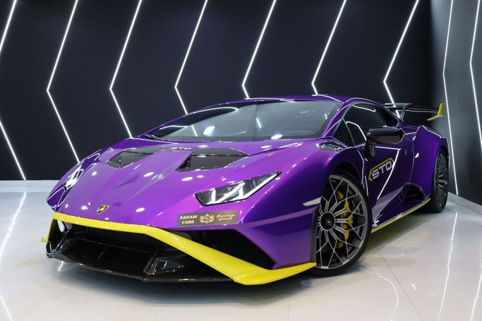 Used Lamborghini Huracán STO I Facelift, 5.2 l, 2022 in Dubai by Sanam Cars, Purple color. GCC Specs | AUTO.AE