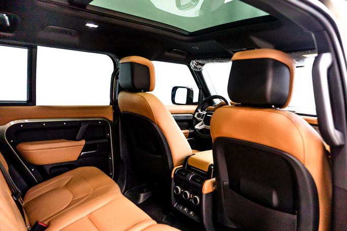 Land Rover Defender 110 II, 2025 standard suv 5 dr. 110 for rent in Dubai by POF RENTAL, green color | AUTO.AE