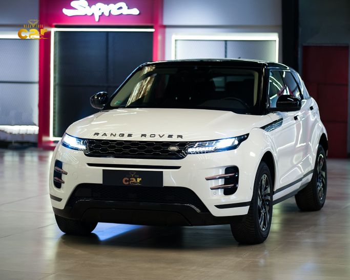 Подержанный Land Rover Range Rover Evoque P200 II, 2.0 л, 2021 в Дубае от Optimus Megatron cars FZE LLC Белый цвет.  | AUTO.AE