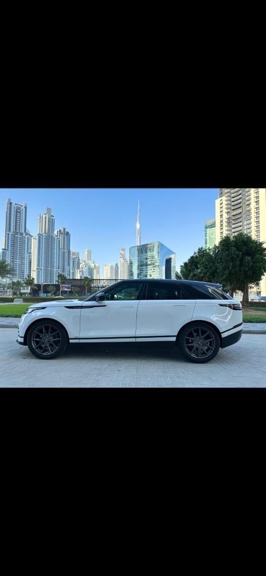 Подержанный Land Rover Range Rover Velar P300 I, 2.0 л, 2021 в Дубае Белый цвет. Американская | AUTO.AE