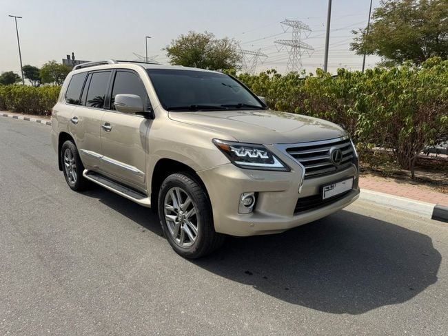 Подержанный Lexus LX 570 III Рестайлинг, 5.7 л, 2013 в Дубае от Al Faisal Motors Золотистый цвет. GCC | AUTO.AE
