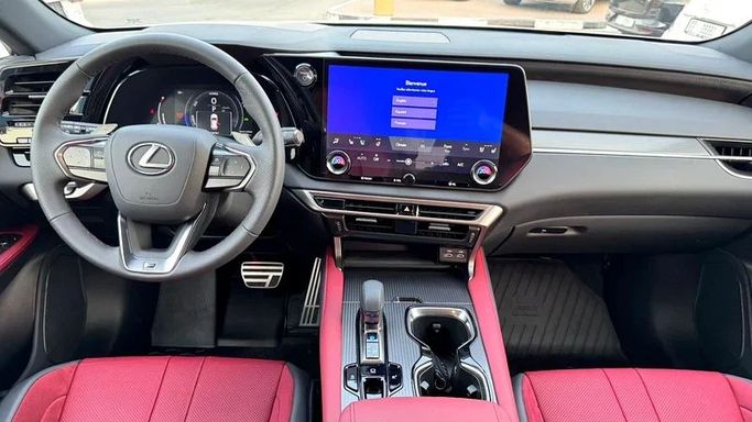 Подержанный Lexus RX 500h V, 2.4 л, 2024 в Дубае от Ignite Used Cars Белый цвет. Канадская | AUTO.AE