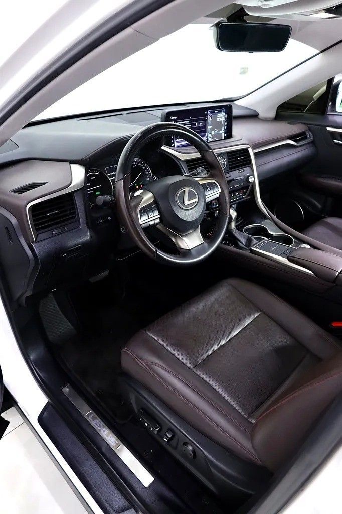 Подержанный Lexus RX 450h IV Рестайлинг, 3.5 л, 2022 в Дубае от Al Faris Motors Белый цвет. GCC | AUTO.AE