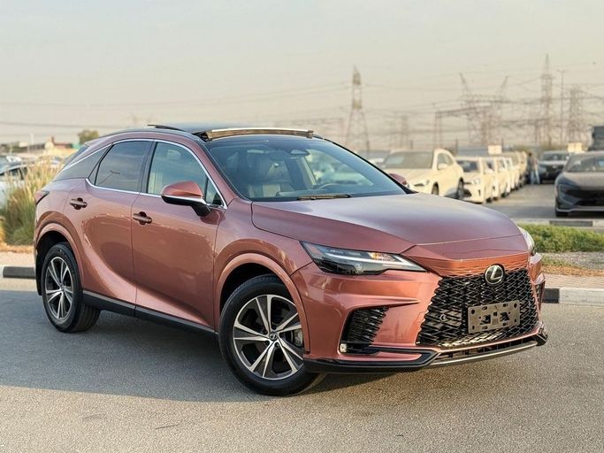 Подержанный Lexus RX 350h V, 2.5 л, 2023 в Дубае от GHAZNI MOTORS Оранжевый цвет. Американская | AUTO.AE