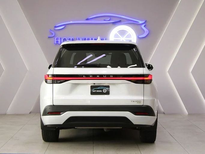 Подержанный Lexus TX 350, 2.4 л, 2024 в Дубае от Hot Wheel Used Motors Белый цвет. Other | AUTO.AE