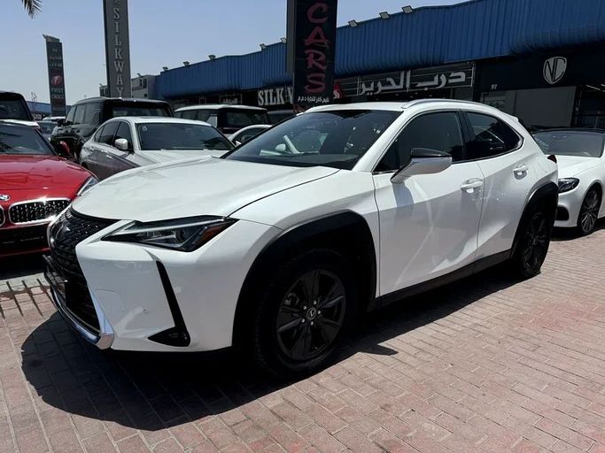 Подержанный Lexus UX 200 I, 2.0 л, 2023 в Дубае от Nice Cars Motos Белый цвет. GCC | AUTO.AE