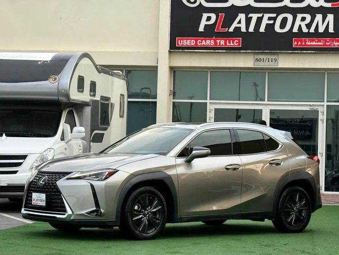 Used Lexus UX 200 I, 2.0 l, 2022 in Dubai by Platform Used Cars, Golden color. GCC Specs | AUTO.AE