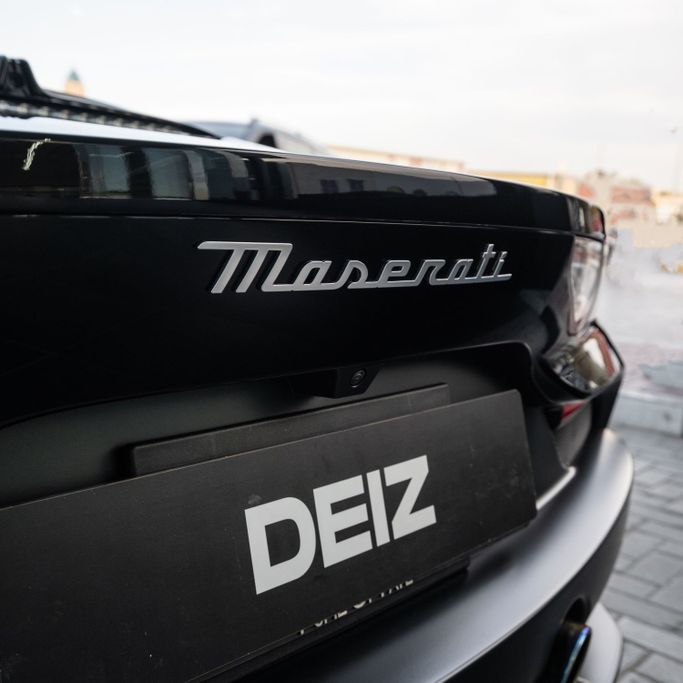 Maserati MC20, 2023 sport coupe for rent in Dubai by DEIZ, black color | AUTO.AE