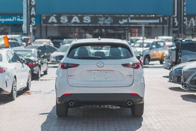 New Mazda CX-5 II Facelift, 2.5 l, 2024 in Dubai by Albakheet Motors, White color. Chinese Specs | AUTO.AE