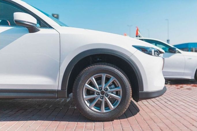 New Mazda CX-5 II Facelift, 2.5 l, 2024 in Dubai by Albakheet Motors, White color. Chinese Specs | AUTO.AE