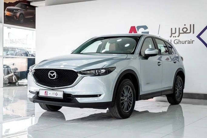 Подержанный Mazda CX-5 II Рестайлинг, 2.5 л, 2023 в Дубае от AG Motors Серебристый цвет. GCC | AUTO.AE