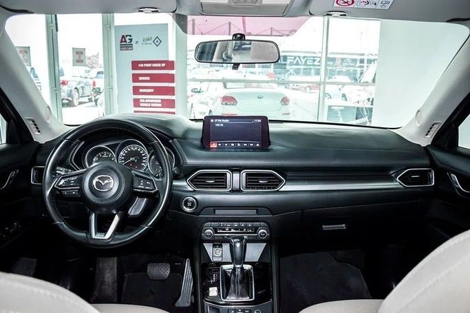 Подержанный Mazda CX-5 II Рестайлинг, 2.5 л, 2023 в Дубае от AG Motors Серебристый цвет. GCC | AUTO.AE