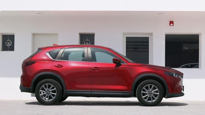 Used Mazda CX-5 II Facelift, 2.0 l, 2024 in Dubai by Cariva Used Cars , Red color. GCC Specs | AUTO.AE
