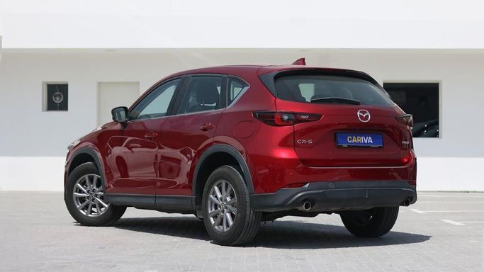 Used Mazda CX-5 II Facelift, 2.0 l, 2024 in Dubai by Cariva Used Cars , Red color. GCC Specs | AUTO.AE