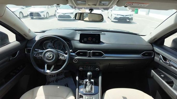 Used Mazda CX-5 II Facelift, 2.5 l, 2023 in Dubai by Cariva Used Cars , Navy Blue color. GCC Specs | AUTO.AE