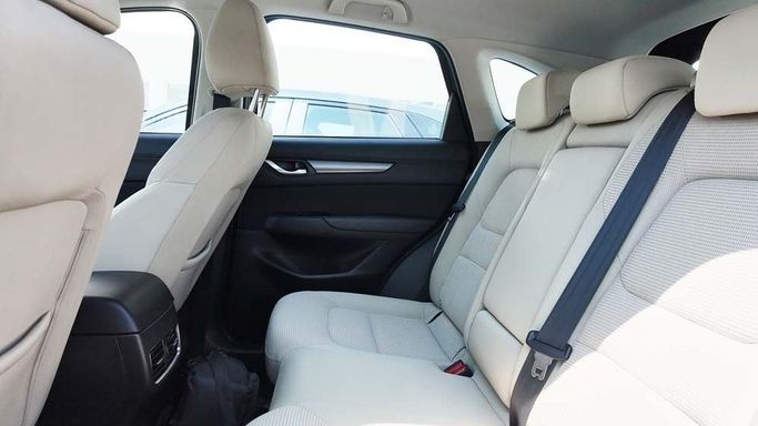 Used Mazda CX-5 II Facelift, 2.5 l, 2023 in Dubai by Cariva Used Cars , Navy Blue color. GCC Specs | AUTO.AE