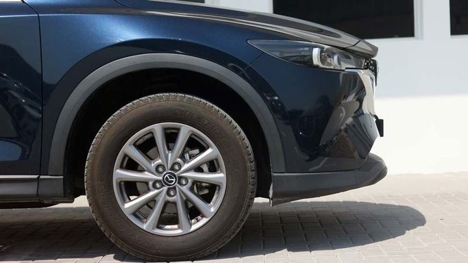 Used Mazda CX-5 II Facelift, 2.5 l, 2023 in Dubai by Cariva Used Cars , Navy Blue color. GCC Specs | AUTO.AE
