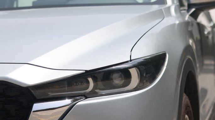 Used Mazda CX-5 II Facelift, 2.5 l, 2023 in Dubai by Cariva Used Cars , Silver color. GCC Specs | AUTO.AE